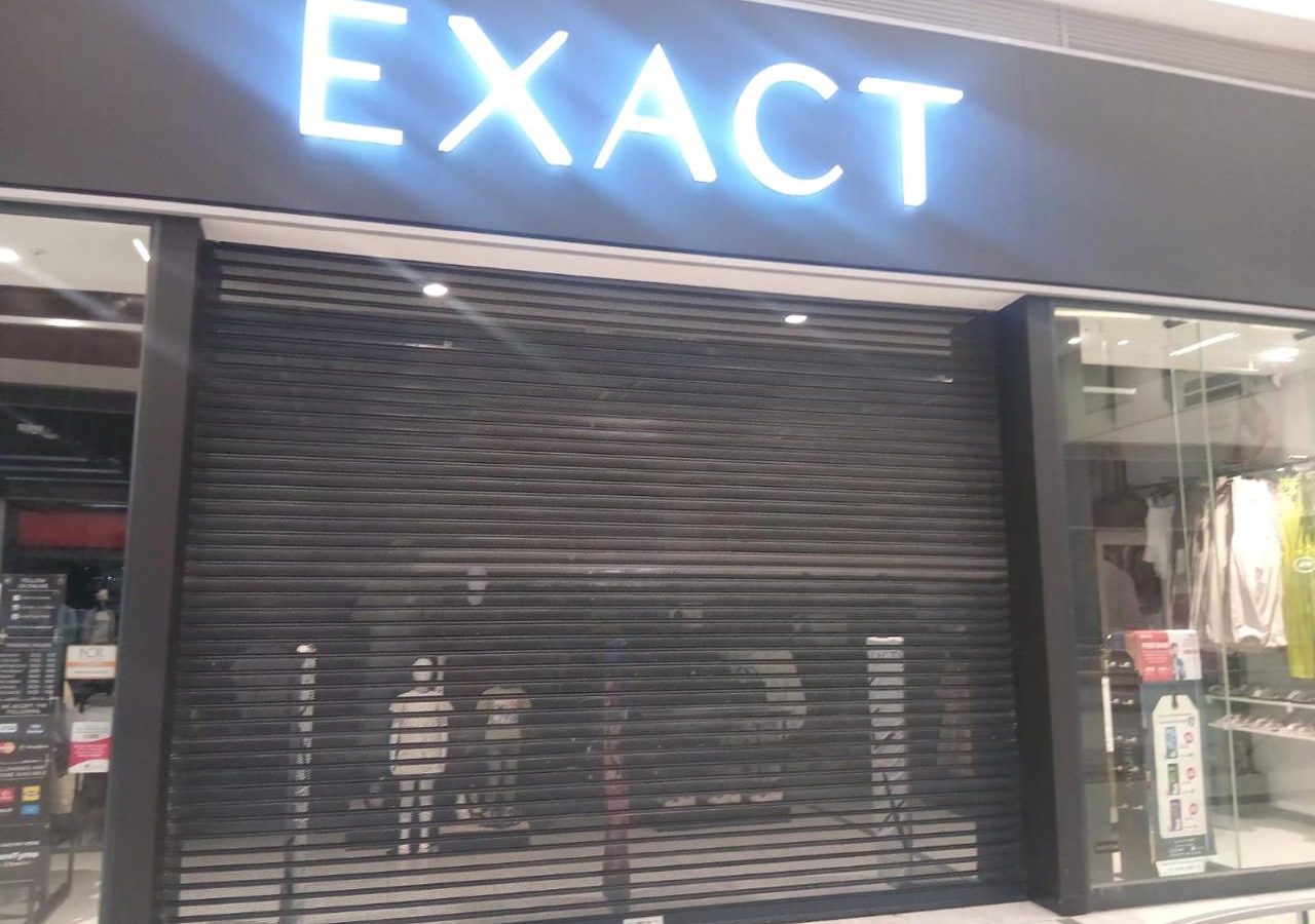 Commercial roller shutter door fitted to a retail shopfront